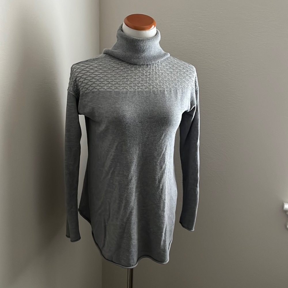 Grey sweater.